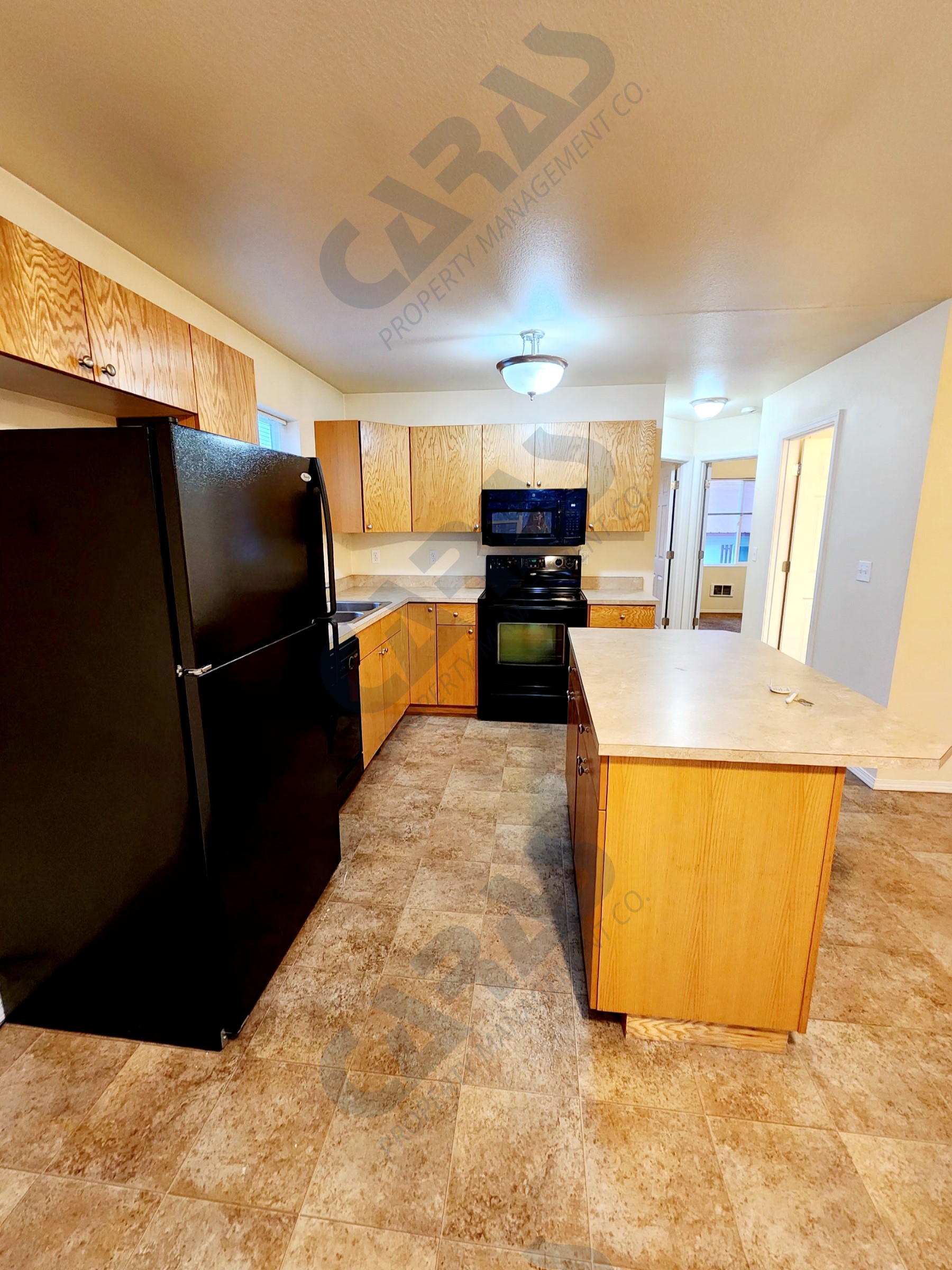 901 13th Ave E, Polson Caras Property Management Co.