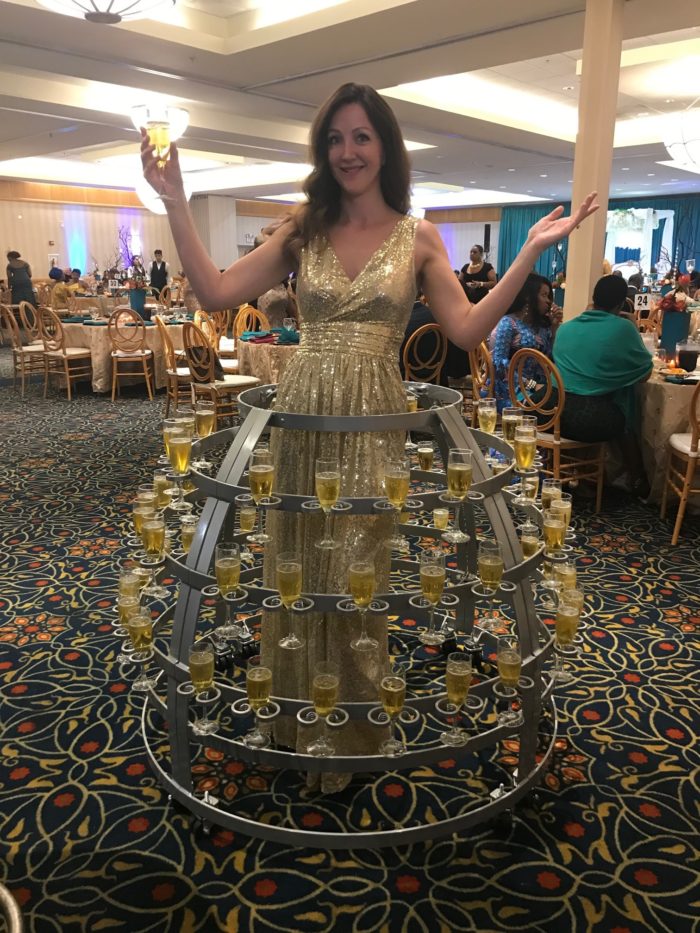 Book the Champagne Lady to Serve Your Event Carbone Entertainment
