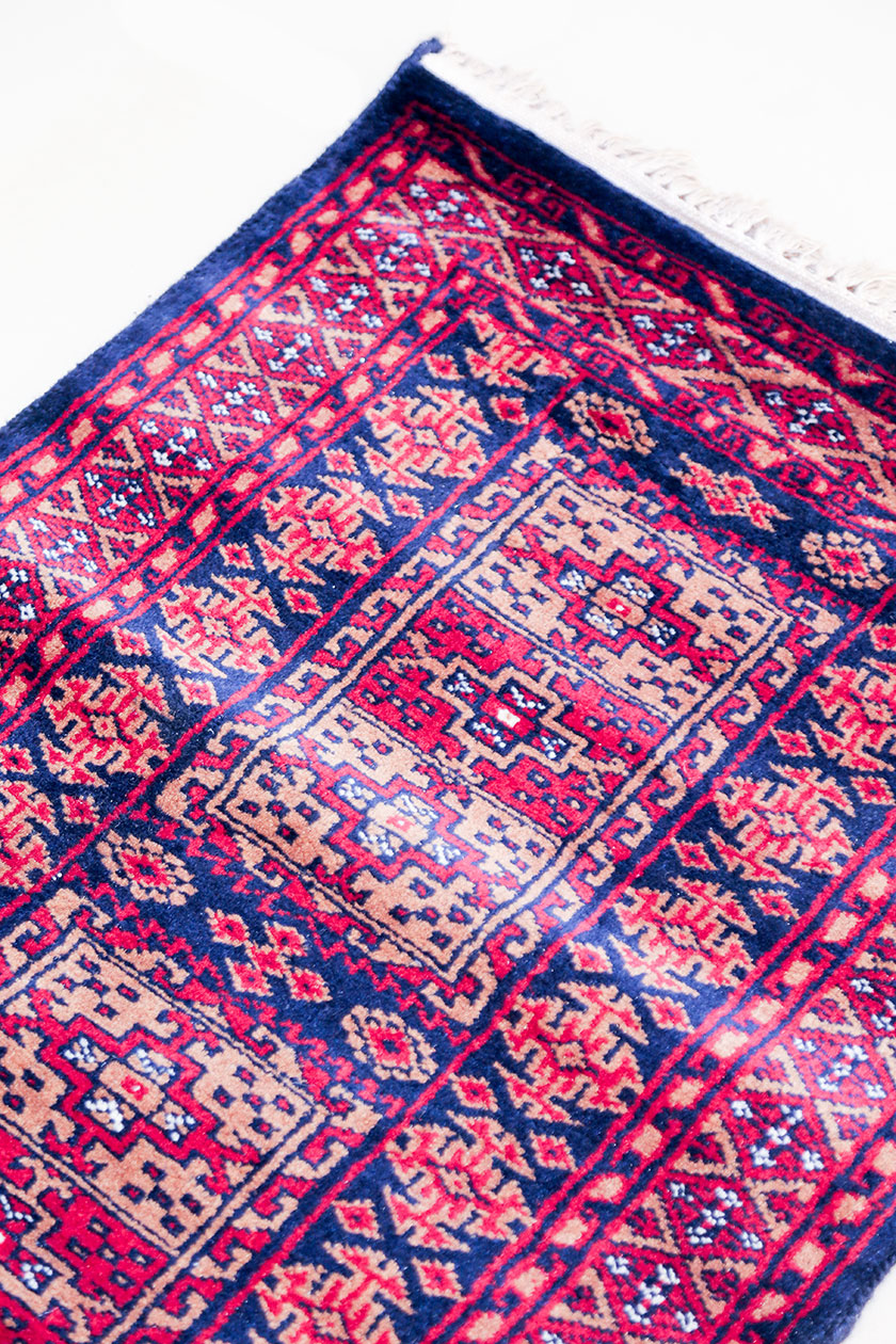 White pure wool bedside rug geometric design handmade and hand knotted