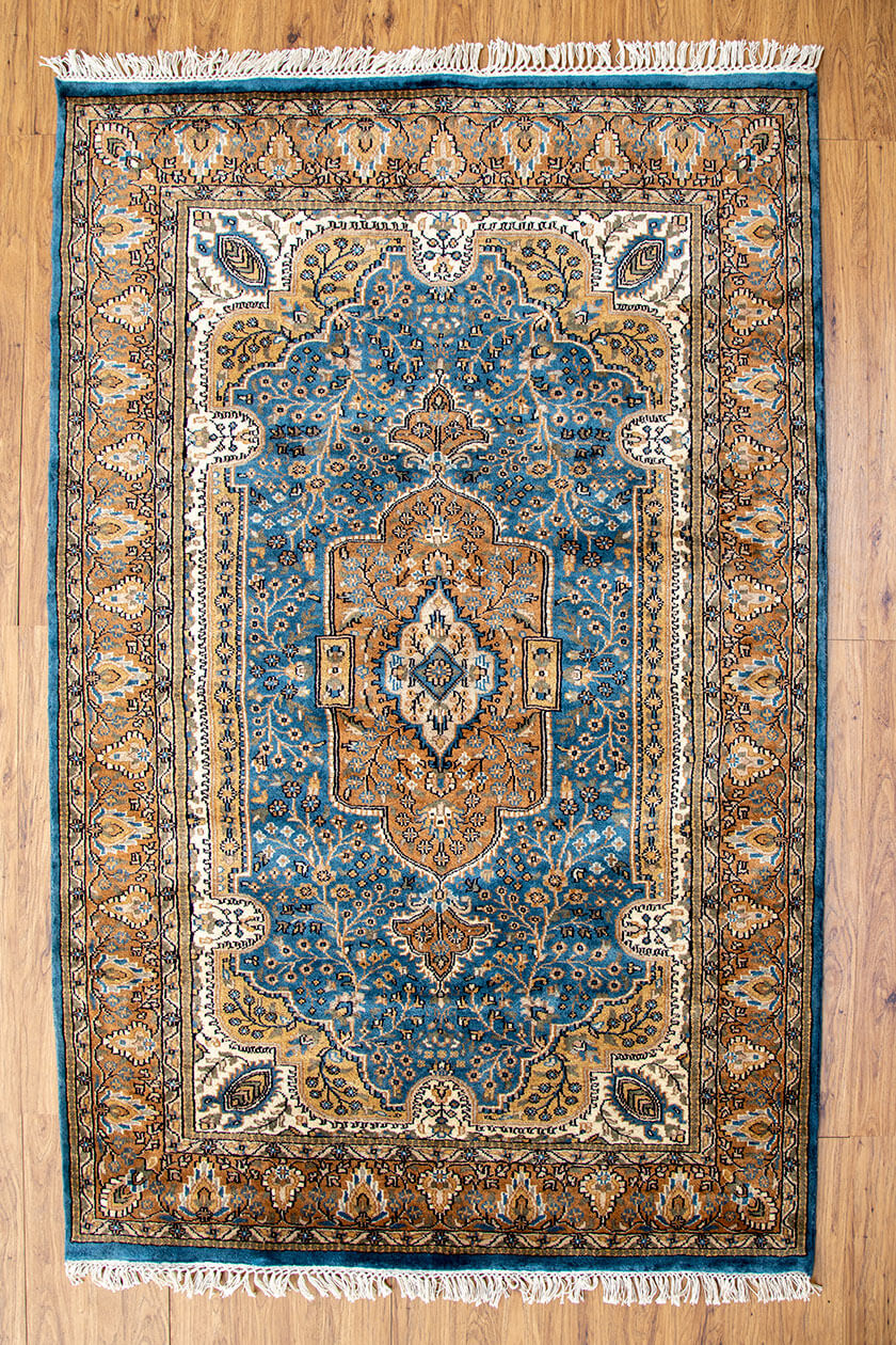 Floral design bespoke coffee table rug handmade and handknotted