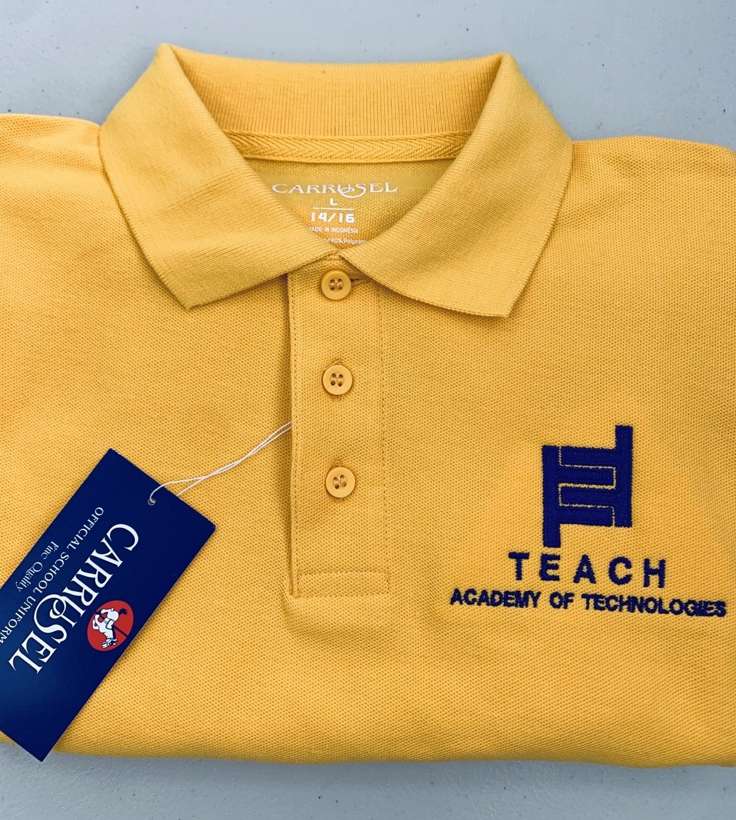 Teach Middle Gold Polo Carrusel Uniforms and Embroidery