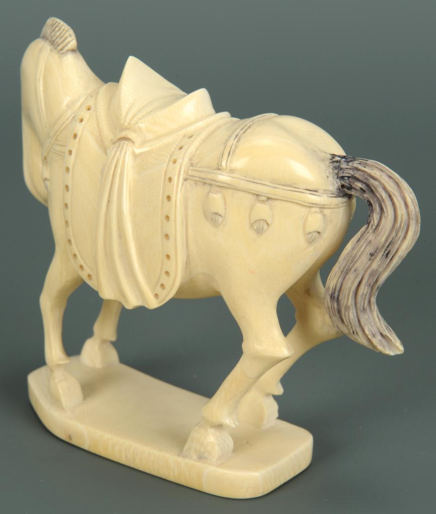 Lot 16 Finely carved ivory horse okimono