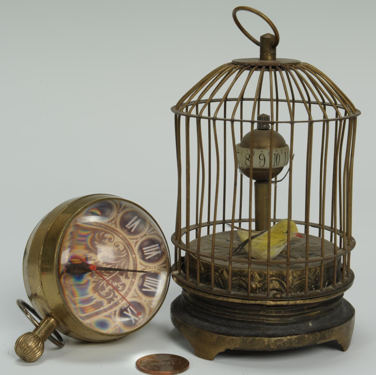 Lot 309 2 novelty clocks Birdcage and Paperweight Case Auctions