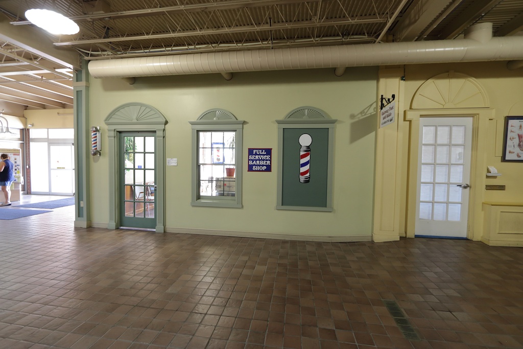 Village Barber Shop to the Shoppes at Caste Village