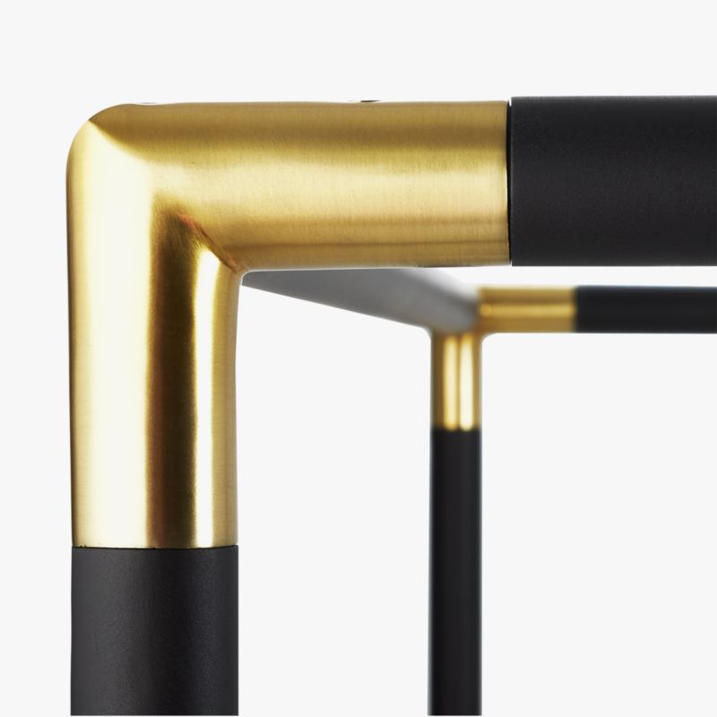 Edged with iron corners finished in glam plated brass, dark design rises 80 high from the ground. Frame Black Metal Canopy Bed Cb2