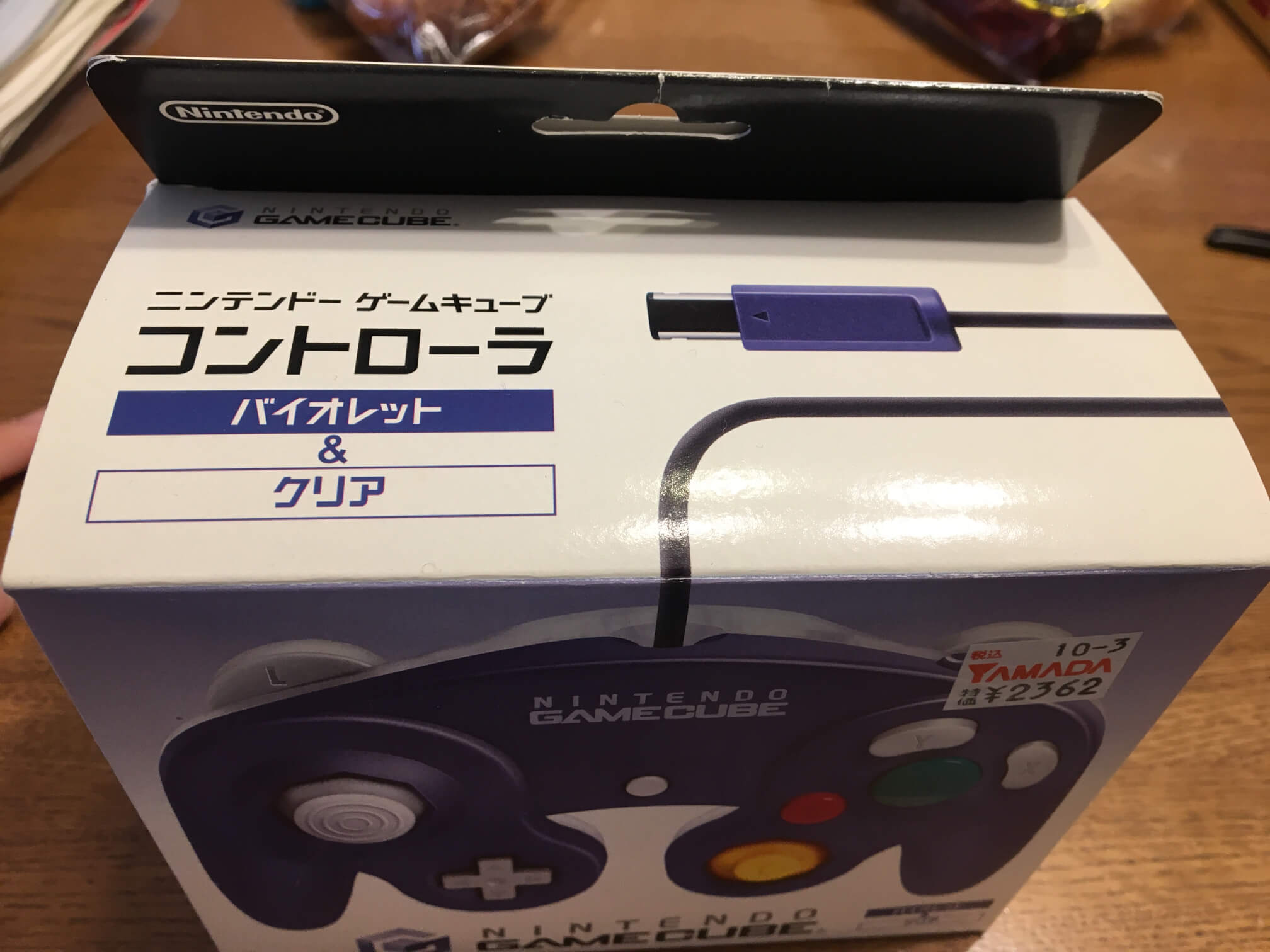 ゲームキューブコントローラーのレアな箱入りとエメラルドブルー
