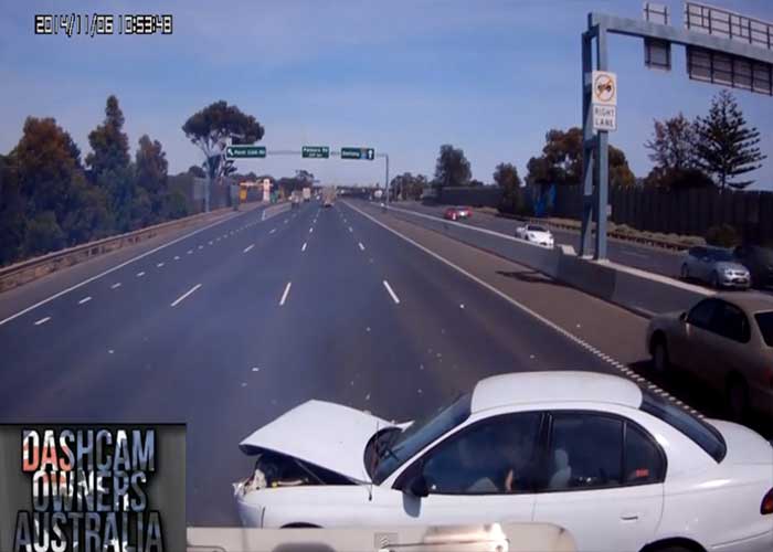 Video: Car Loses Control in Front of Truck