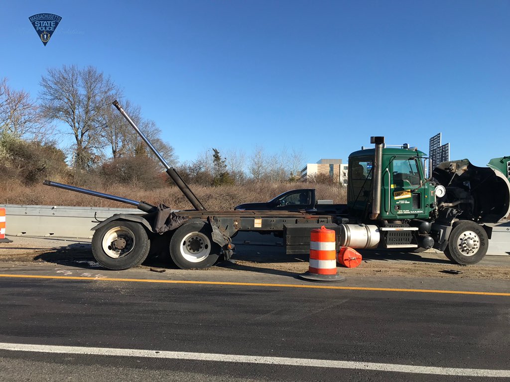 Truck driver hospitalized after bridge strike