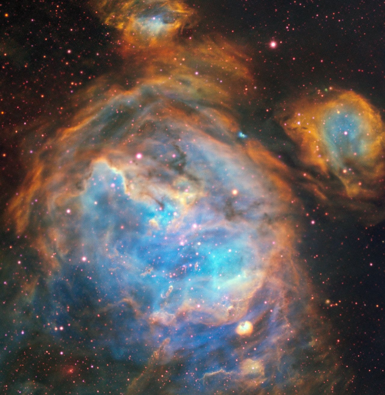 Bubbles of brand new stars pictured in a stellar nursery
