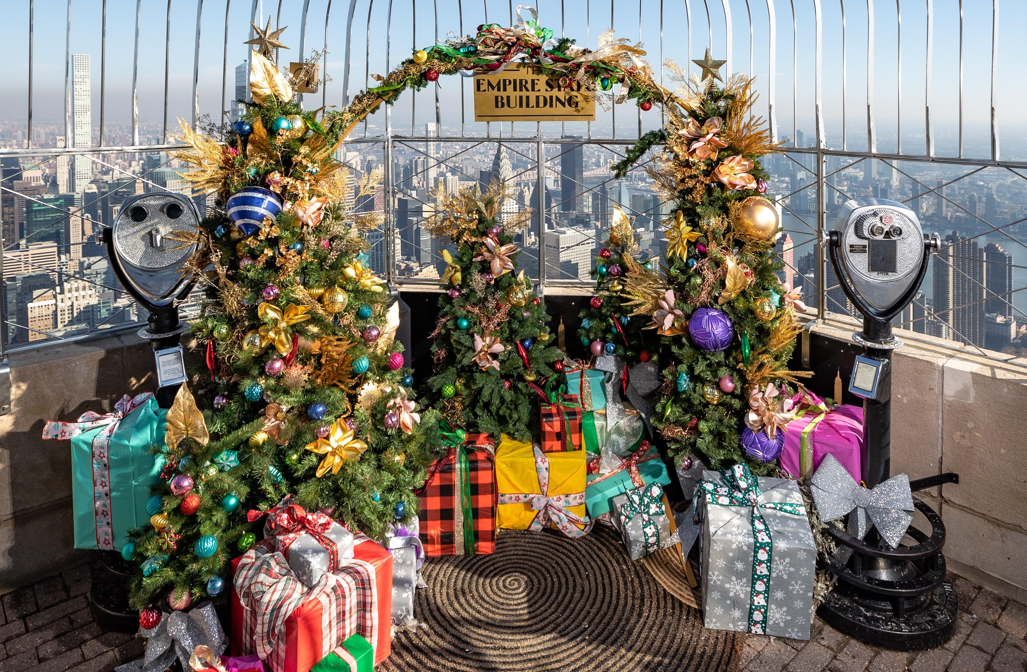 Empire State Building unveils holiday decorations, window displays, and
