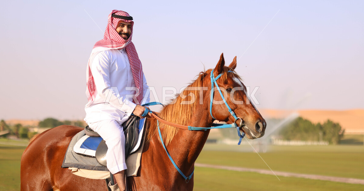 A Saudi Arabian Gulf man riding horses, purebred Arabian horses, hobby