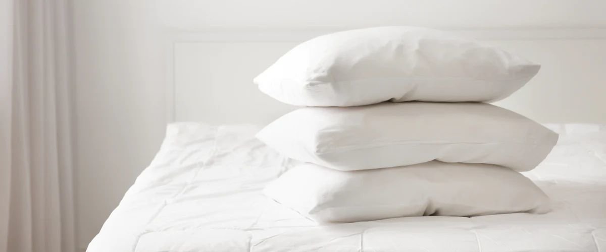 The Perfect Pillow How To Choose Between Down, Feather, Foam, and More