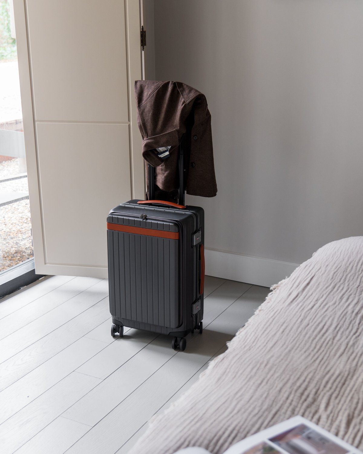 How to pack a suit in a suitcase