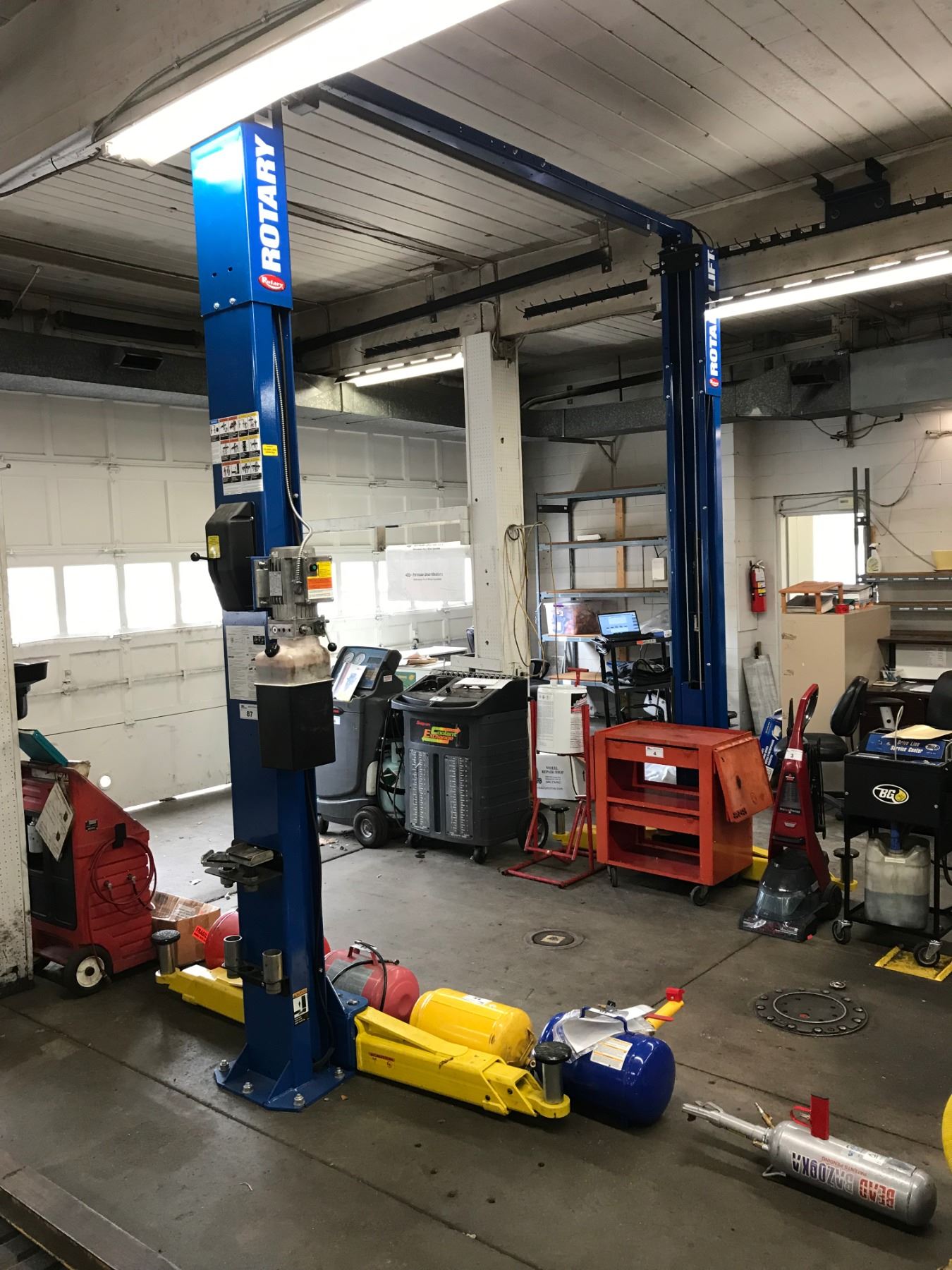 A Rotary Car Lift Can Help You Repair Or Access Your Vehicle Carhampt