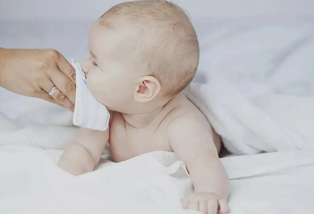 Baby Spitting Up Mucus: Causes, Prevention & When To Worry