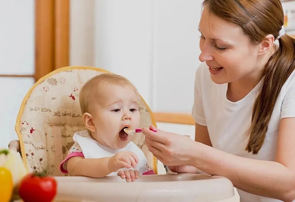 Baby Spitting Up Mucus: Causes, Prevention & When To Worry