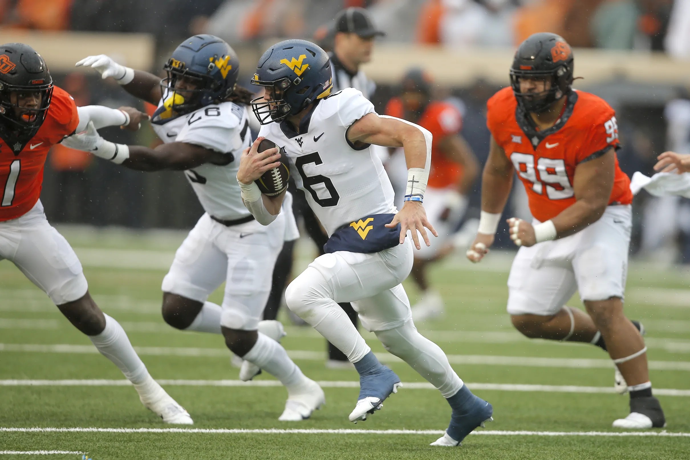 West Virginia steals season finale in Stillwater, holds off Oklahoma
