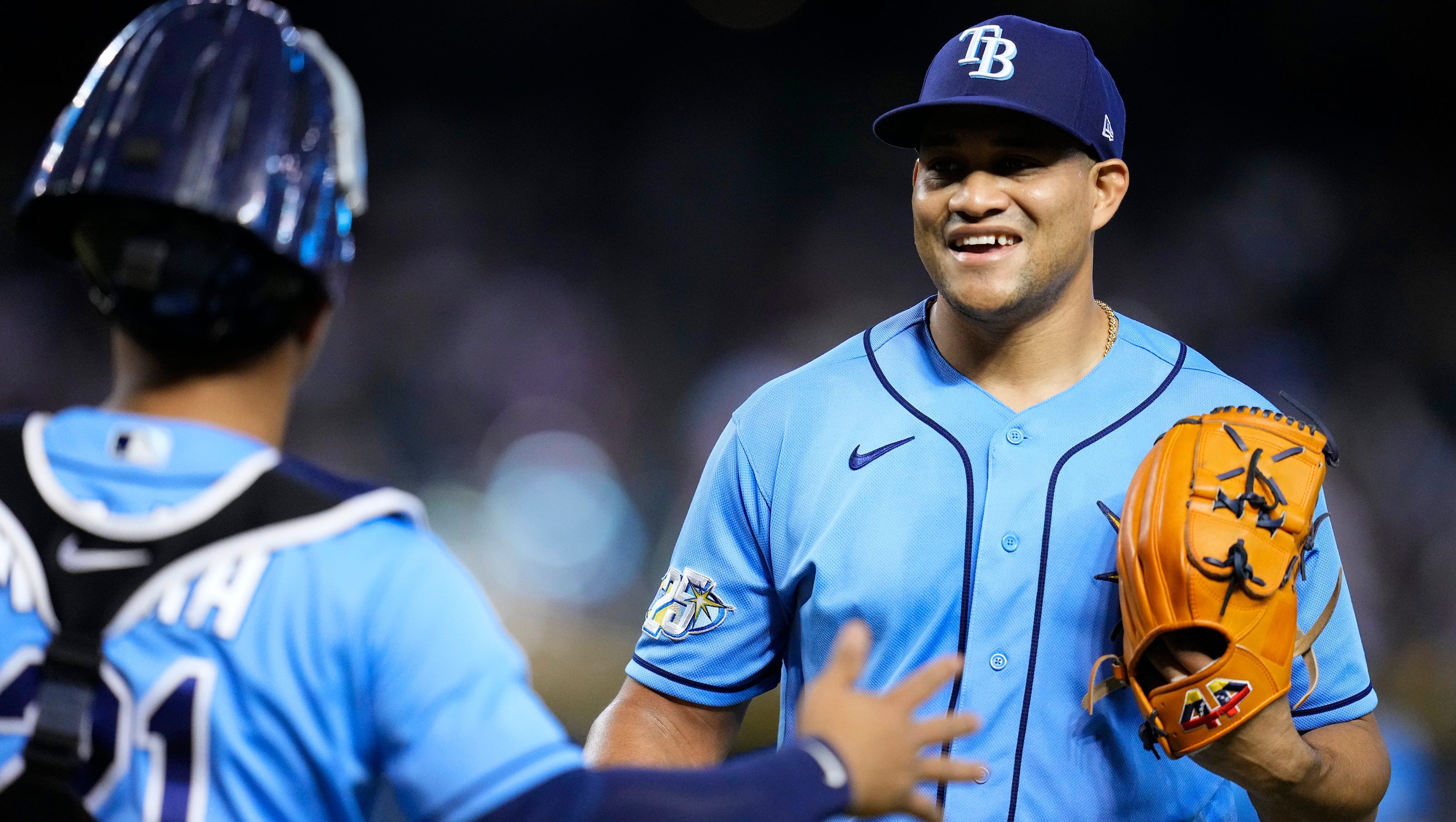 Why is a Braves player wearing pearls? The story behind Joc Pederson's