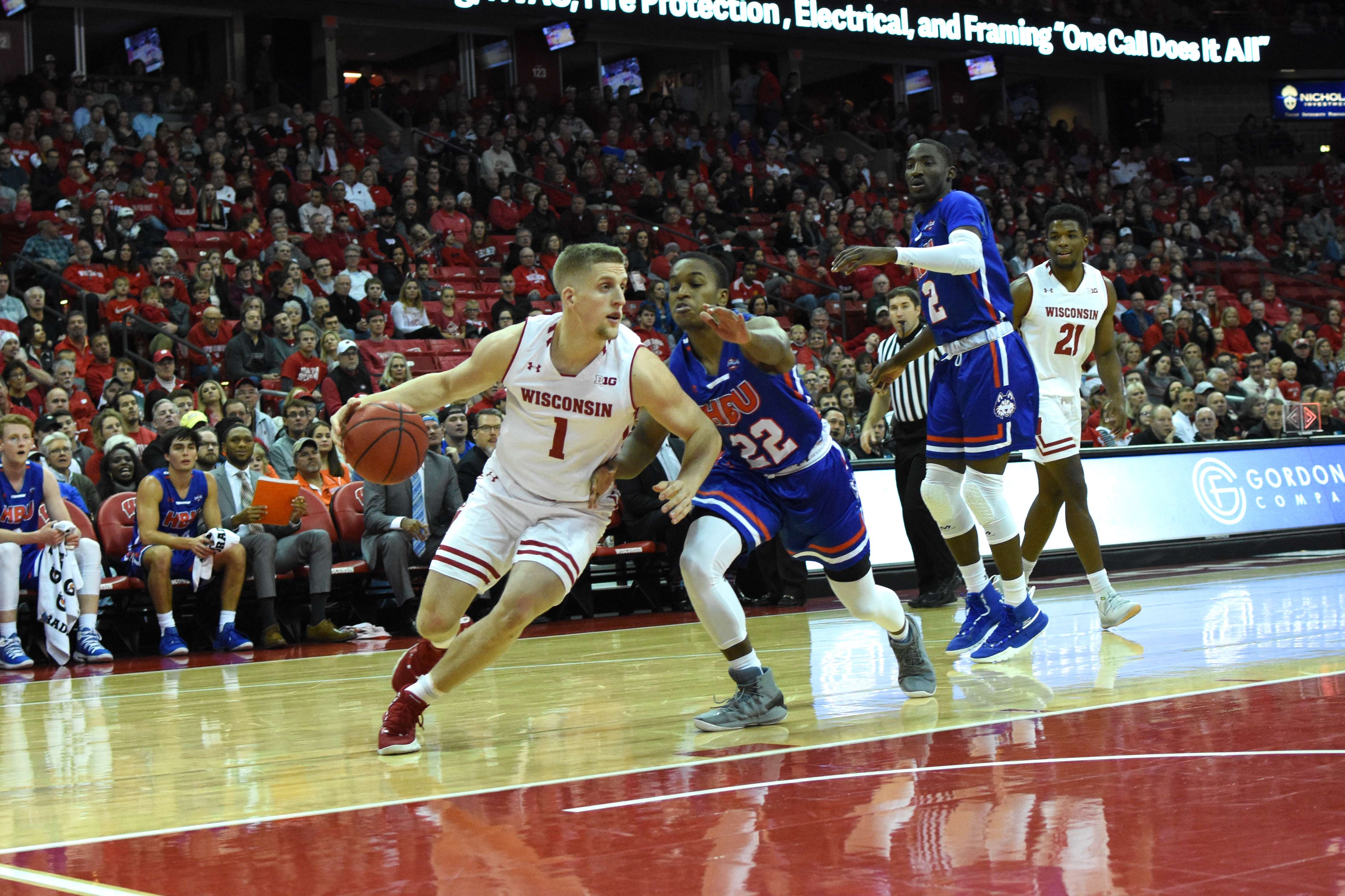 Men’s basketball Late game threes give Badgers victory in Big Ten