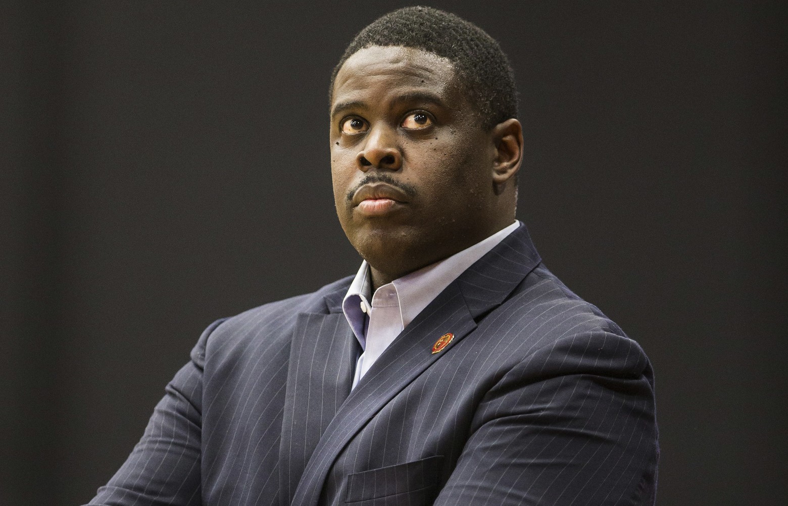 Former Redhawks men’s basketball coach Cameron Dollar alleges racial