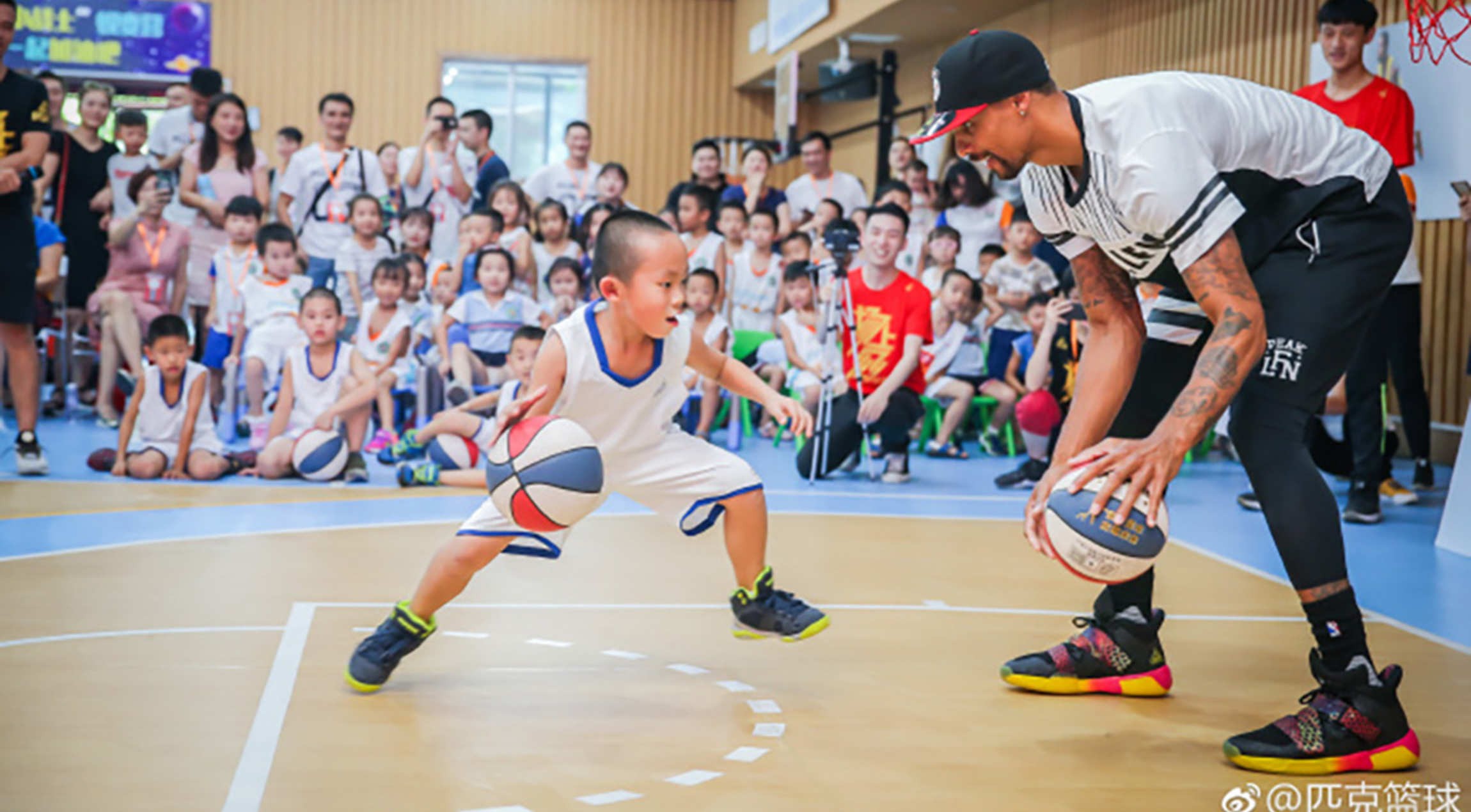 Hill Hosts Basketball Camps in China