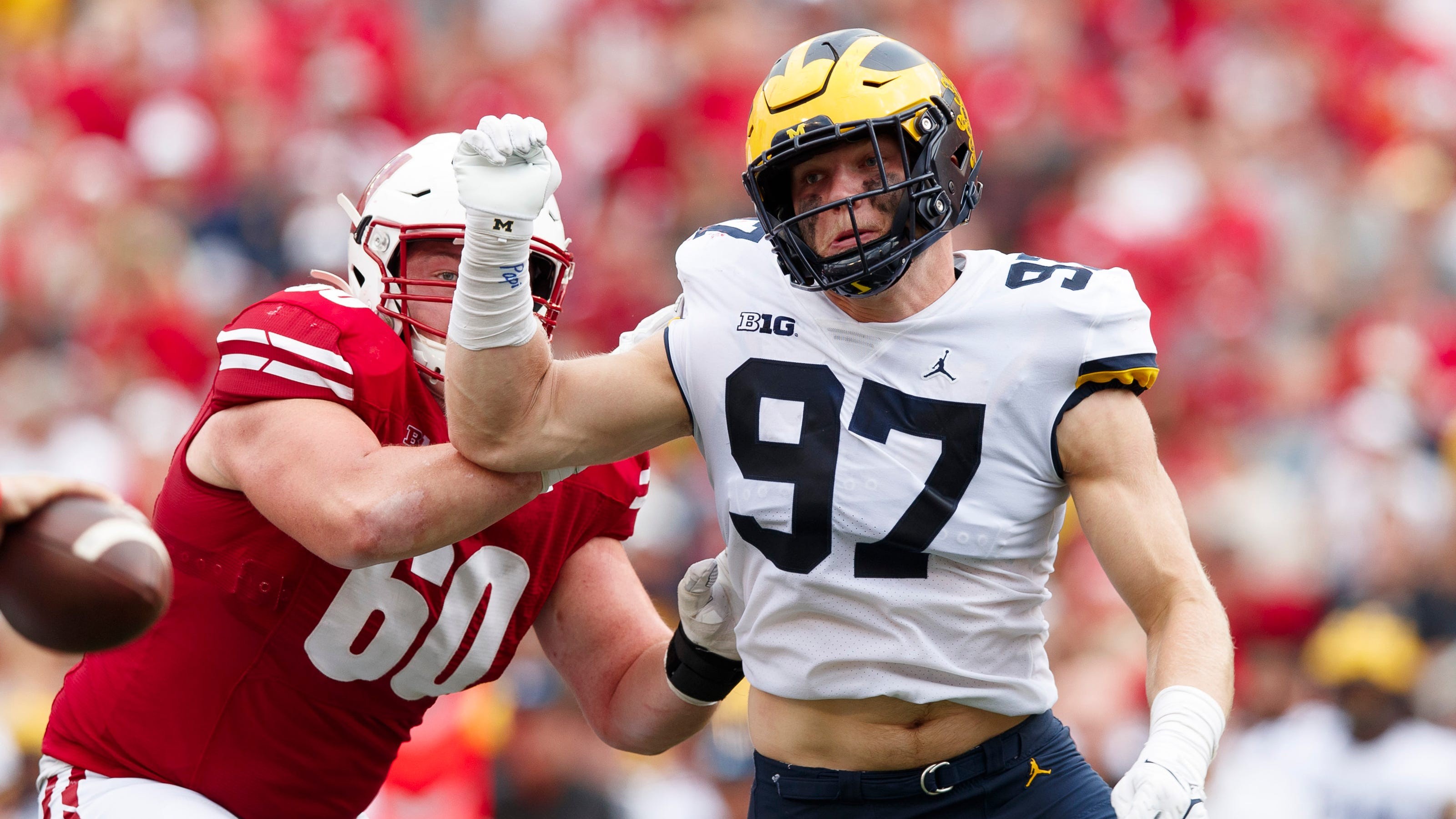 Michigan football's Aidan Hutchinson eager to beat exroommate, MSU's