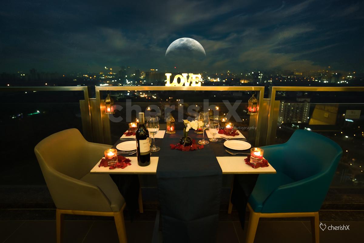 A Breathtaking Romantic Candle Light Dinner with Balcony View on 16th Floor in Delhi NCR Delhi NCR