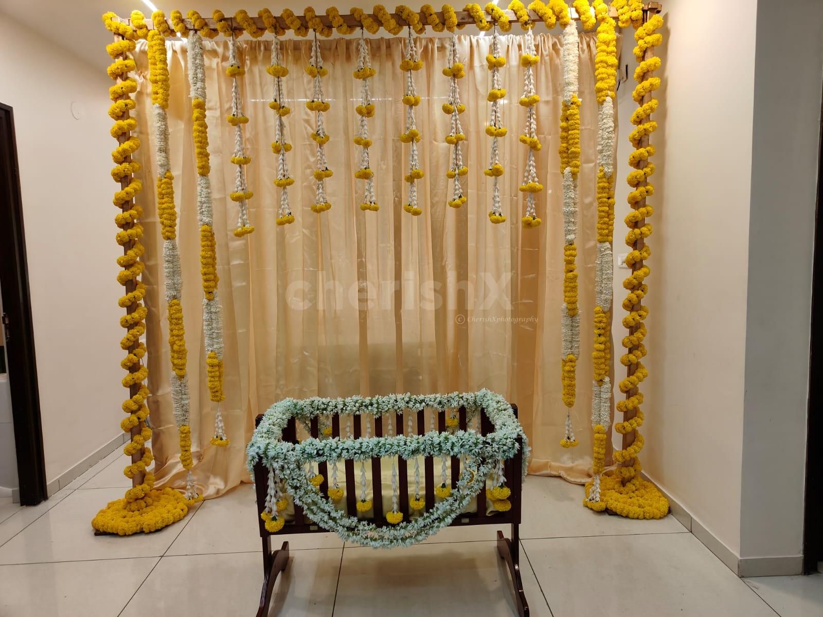 A Perfect Classy Naming Ceremony with our Flower Decoration at Home