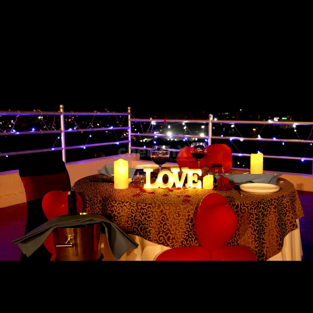 Elevate your date night with Rooftop Candle Light Dining & dessert