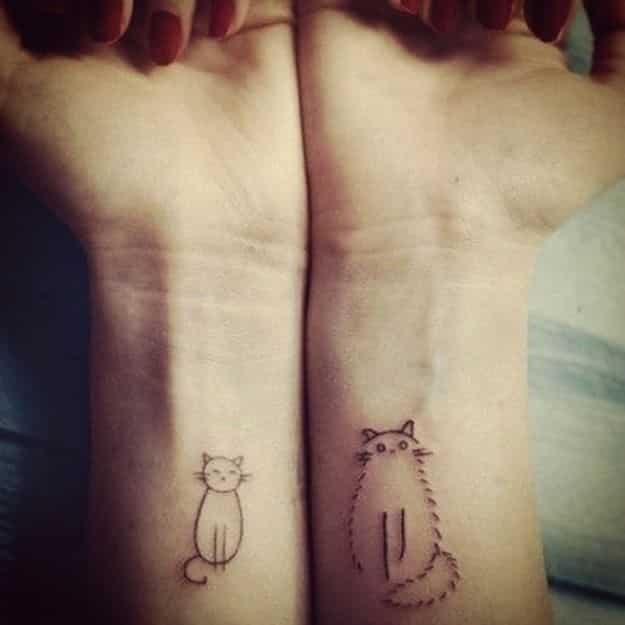 40 Adorable Cute Cat Tattoos And Designs 625_x_625_jpg