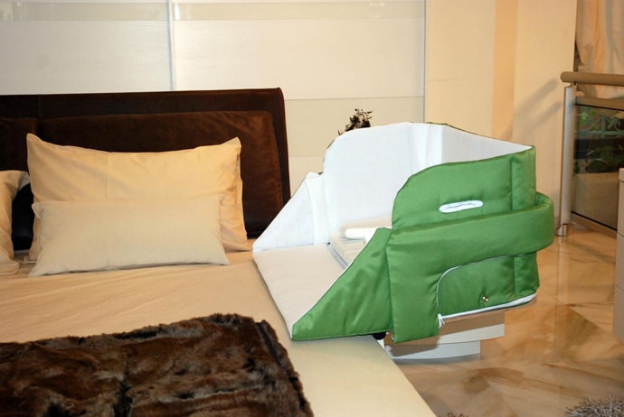 The Culla Belly CoSleeper Attaches onto Beds For Easy Access
