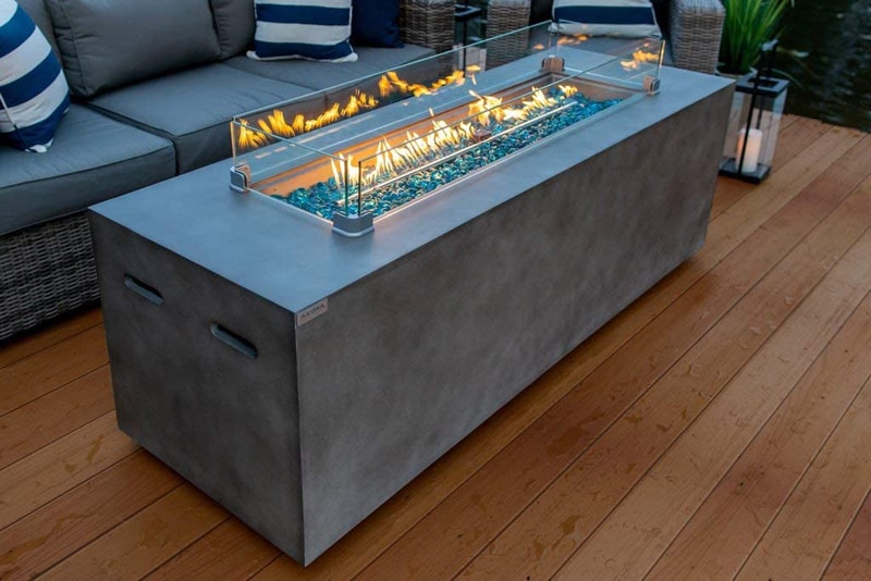 A gas burner adds convenience and aesthetic. Linear Outdoor Propane Gas Fire Pit Table in Gray