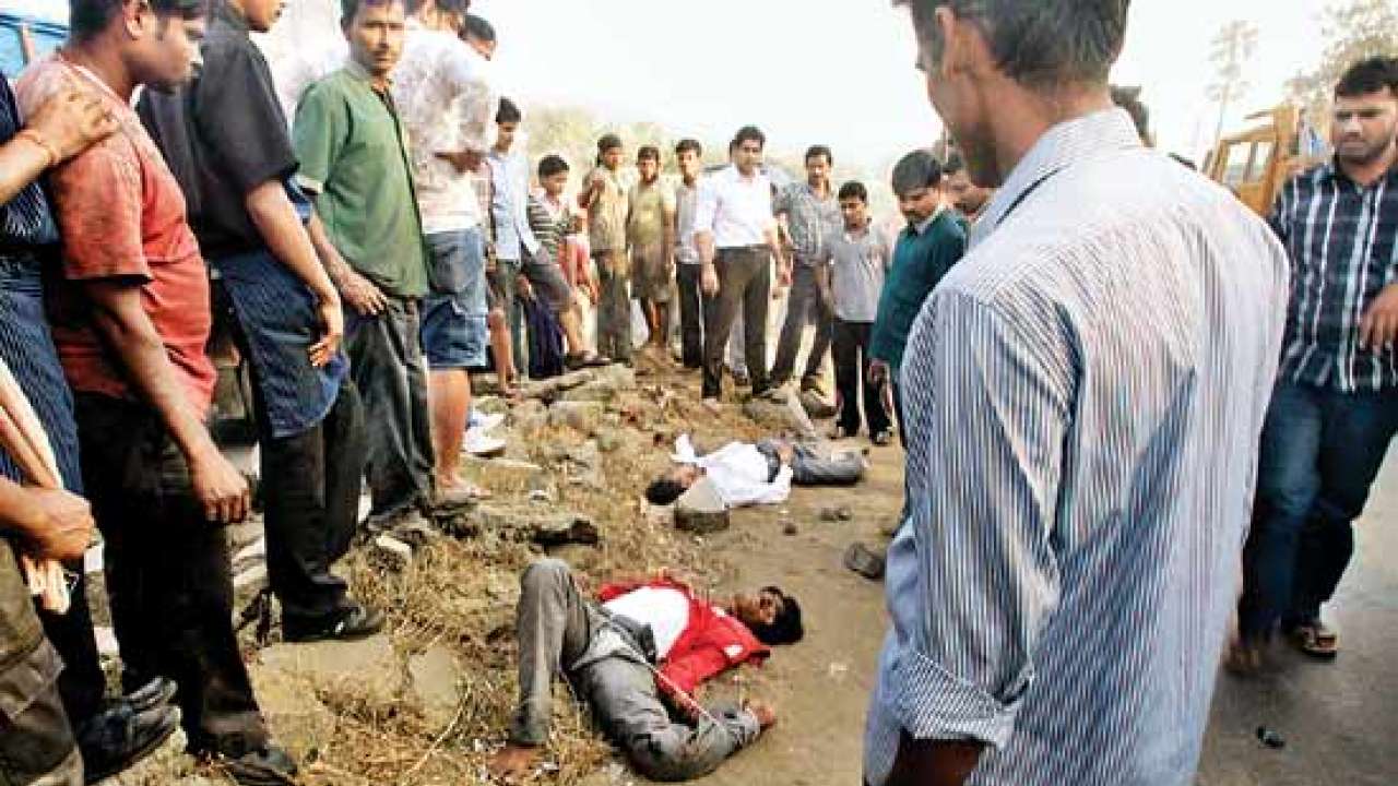 Shocking pix People watch as hitandrun victims lie on road