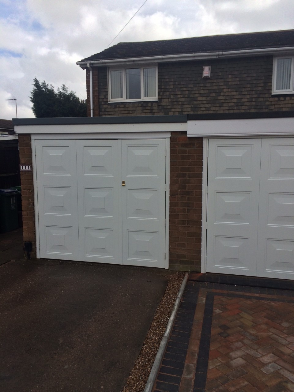 side hinged garage door