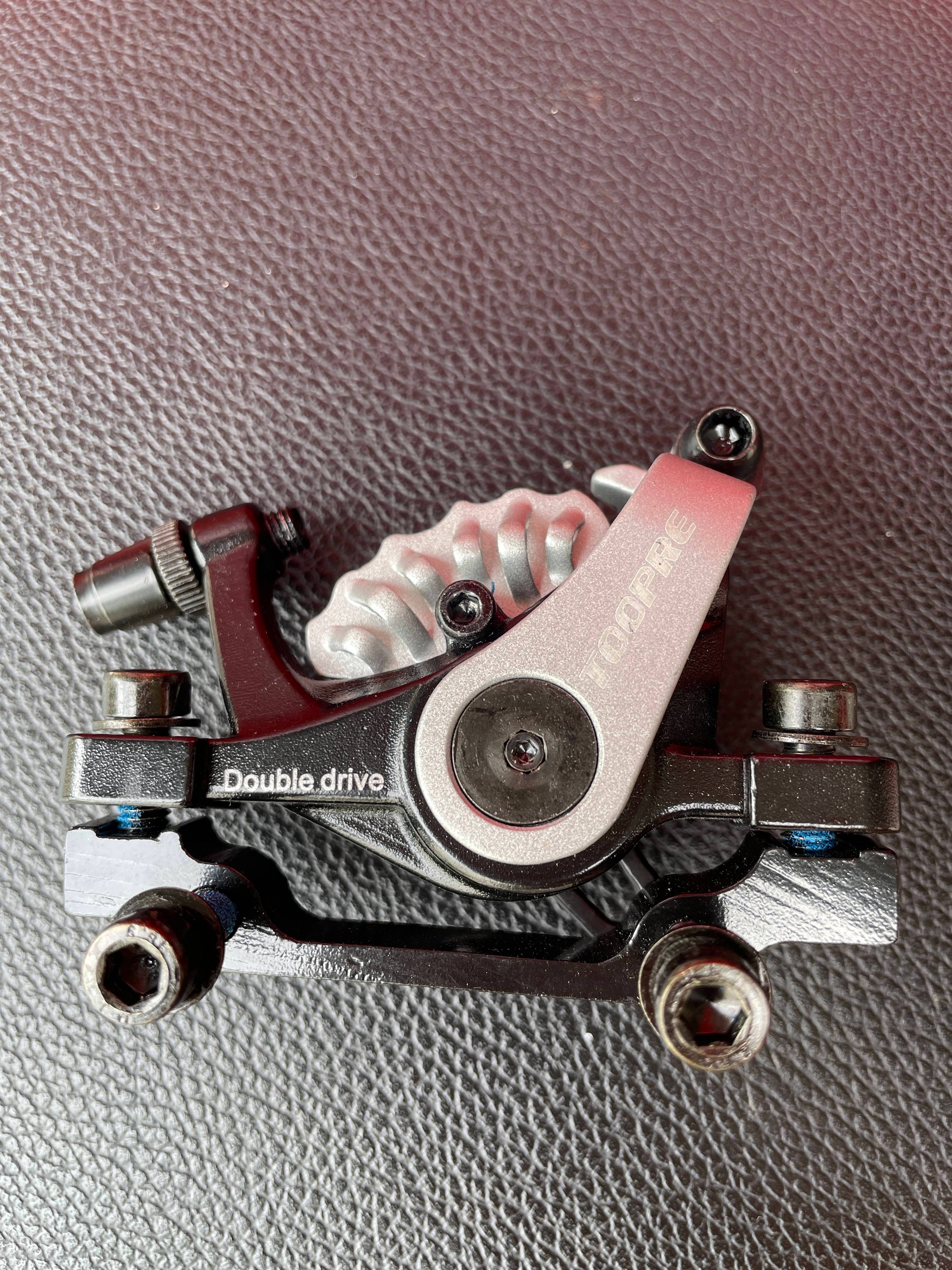 Hybrid Hydraulic Mechanical Disc Caliper