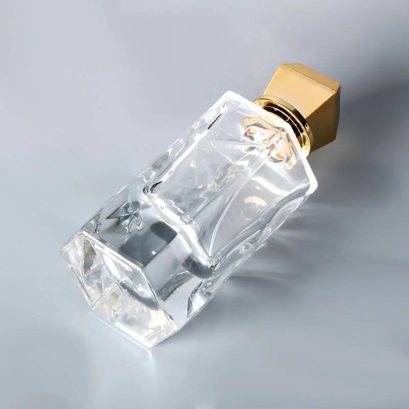 China Thick base crystal perfume glass bottles 100ml mens perfume bottle manufacturers factory