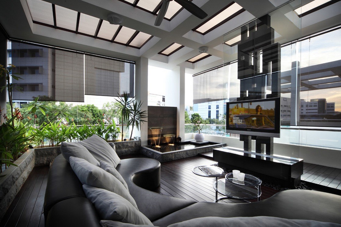modern leather lounge entertainment are bordered by living water garden
