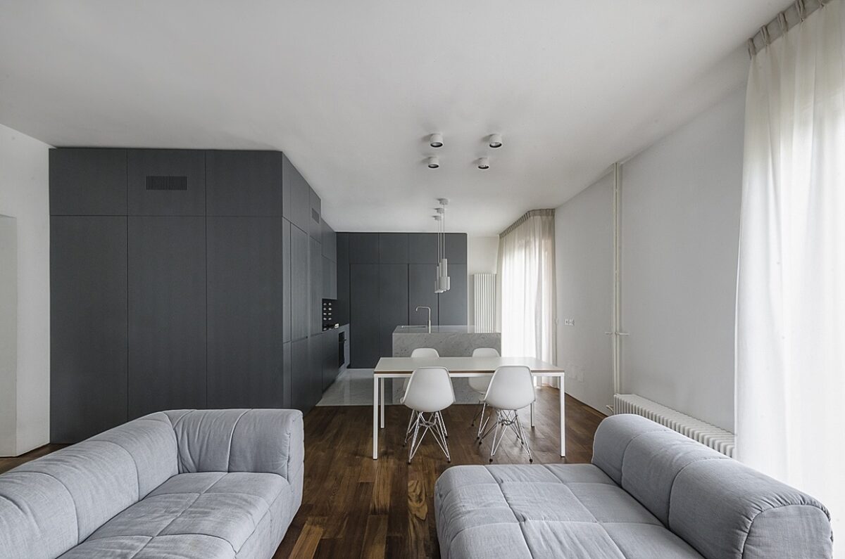Italian Apartment Renovation Brings Open Space to 1960s Home