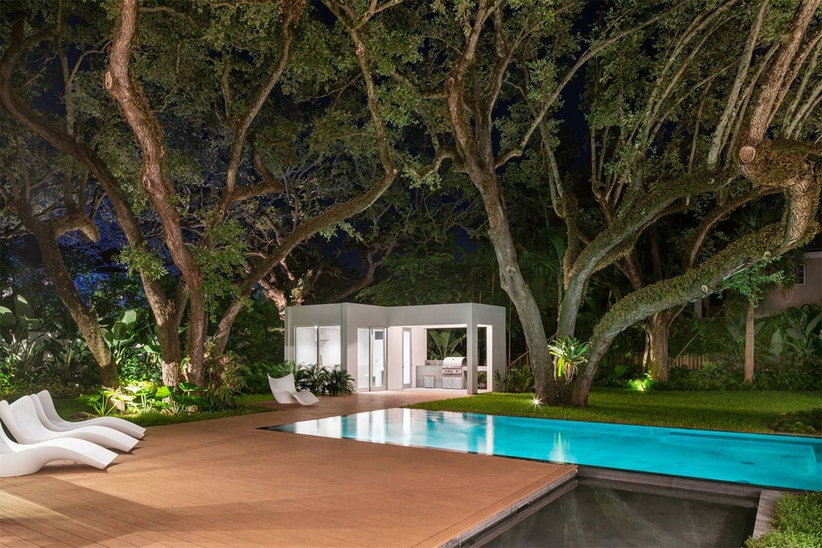 Shiny New Miami Mansion Under A Canopy Of Oak Trees