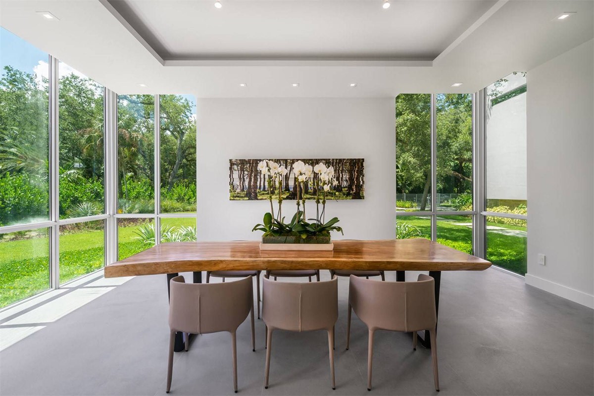 Shiny New Miami Mansion Under A Canopy Of Oak Trees