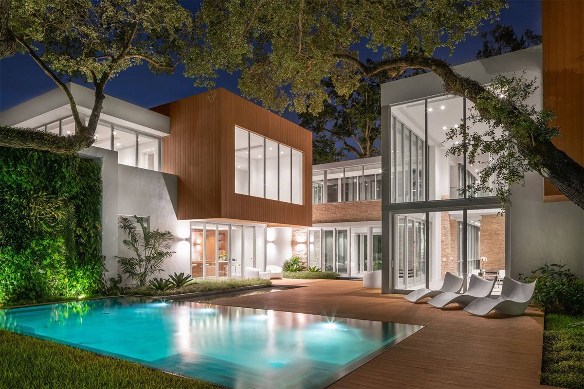 Shiny New Miami Mansion Under A Canopy Of Oak Trees