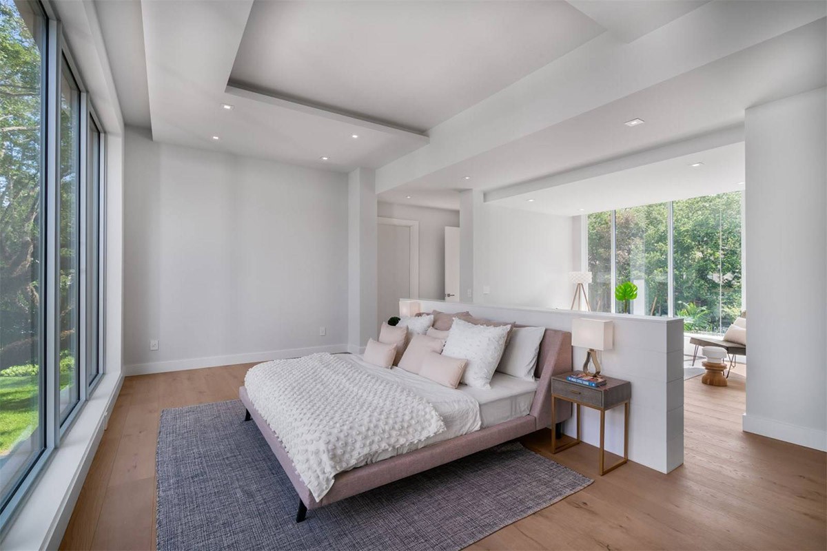 Shiny New Miami Mansion Under A Canopy Of Oak Trees