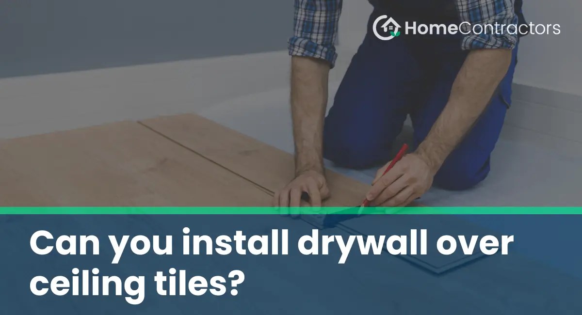 Can you install drywall over ceiling tiles?