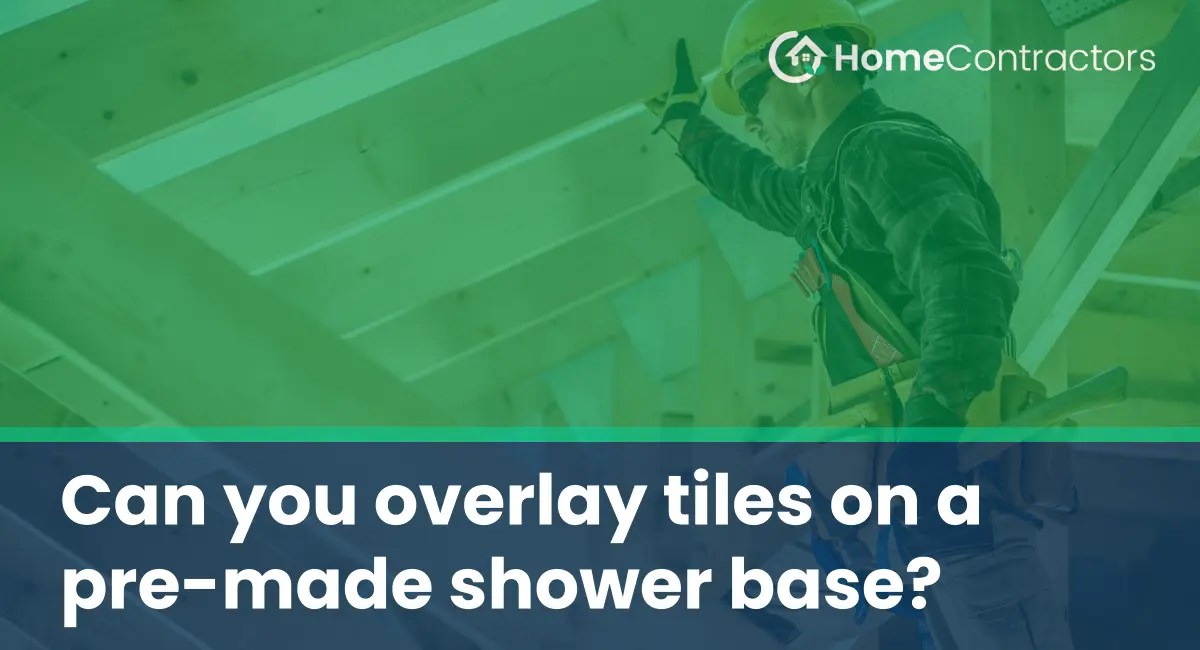 Can you overlay tiles on a premade shower base?
