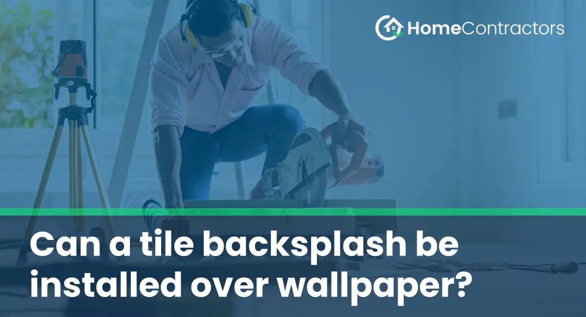 Can a tile backsplash be installed over wallpaper?