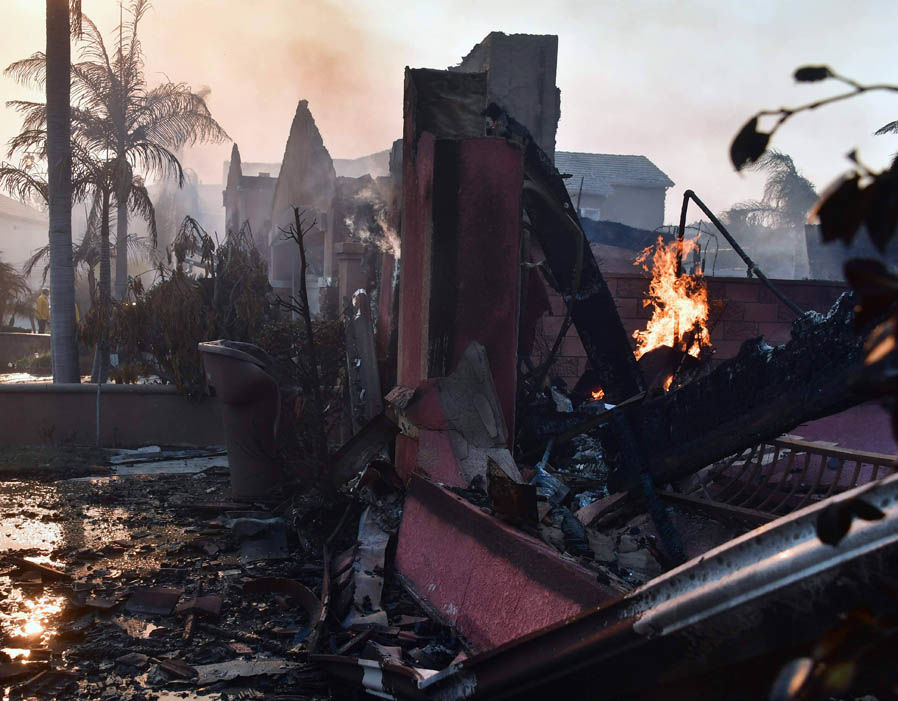 Embers continue to burn amid demolished homes in the Anaheim Hills