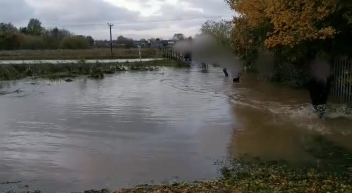 Kids caught wading through waist high flood water after Freshney breaks