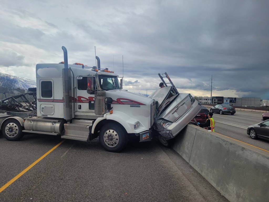 One extracted safely in car crash with semitruck