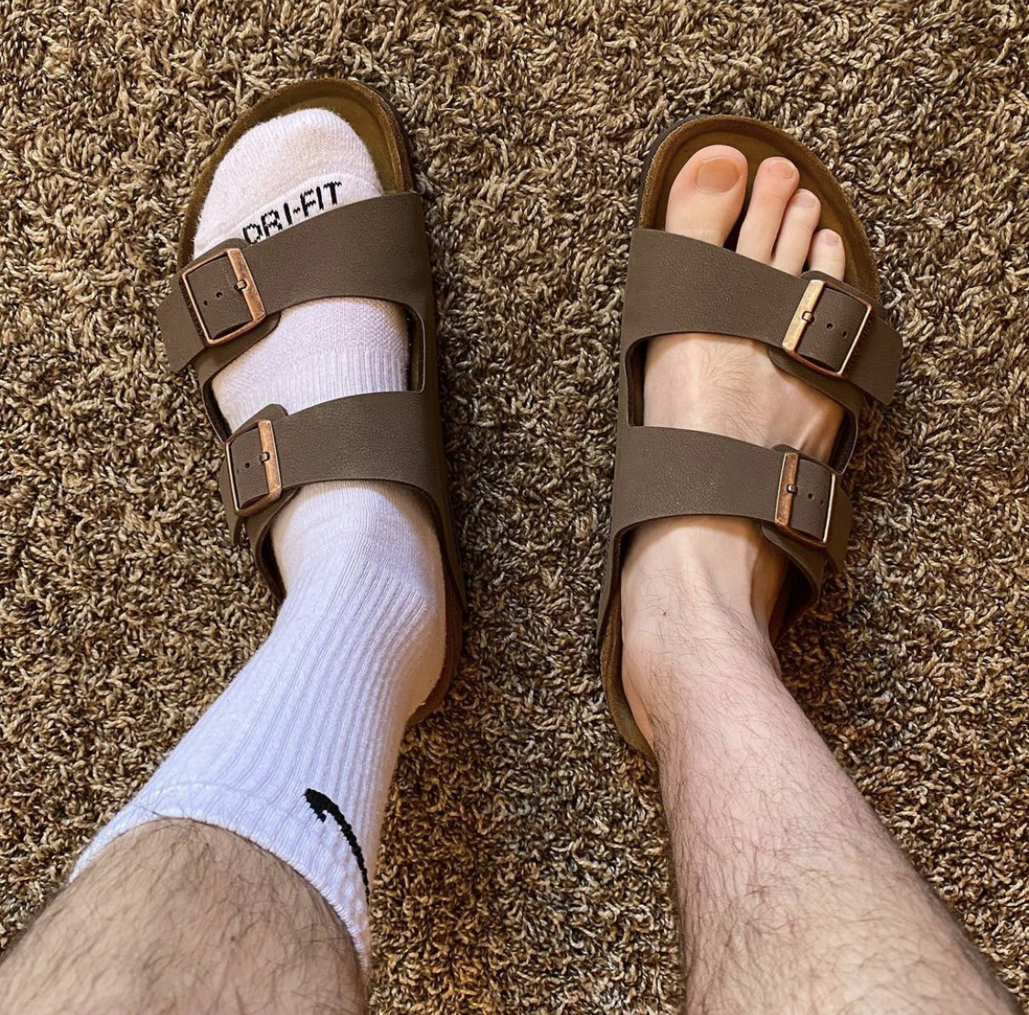 Justinpageft bare foot and in white Nike crew socks and Birkenstocks