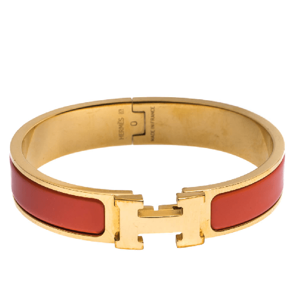 PreOwned Hermes Clic H Orange Enamel Gold Plated Narrow Bracelet Pm